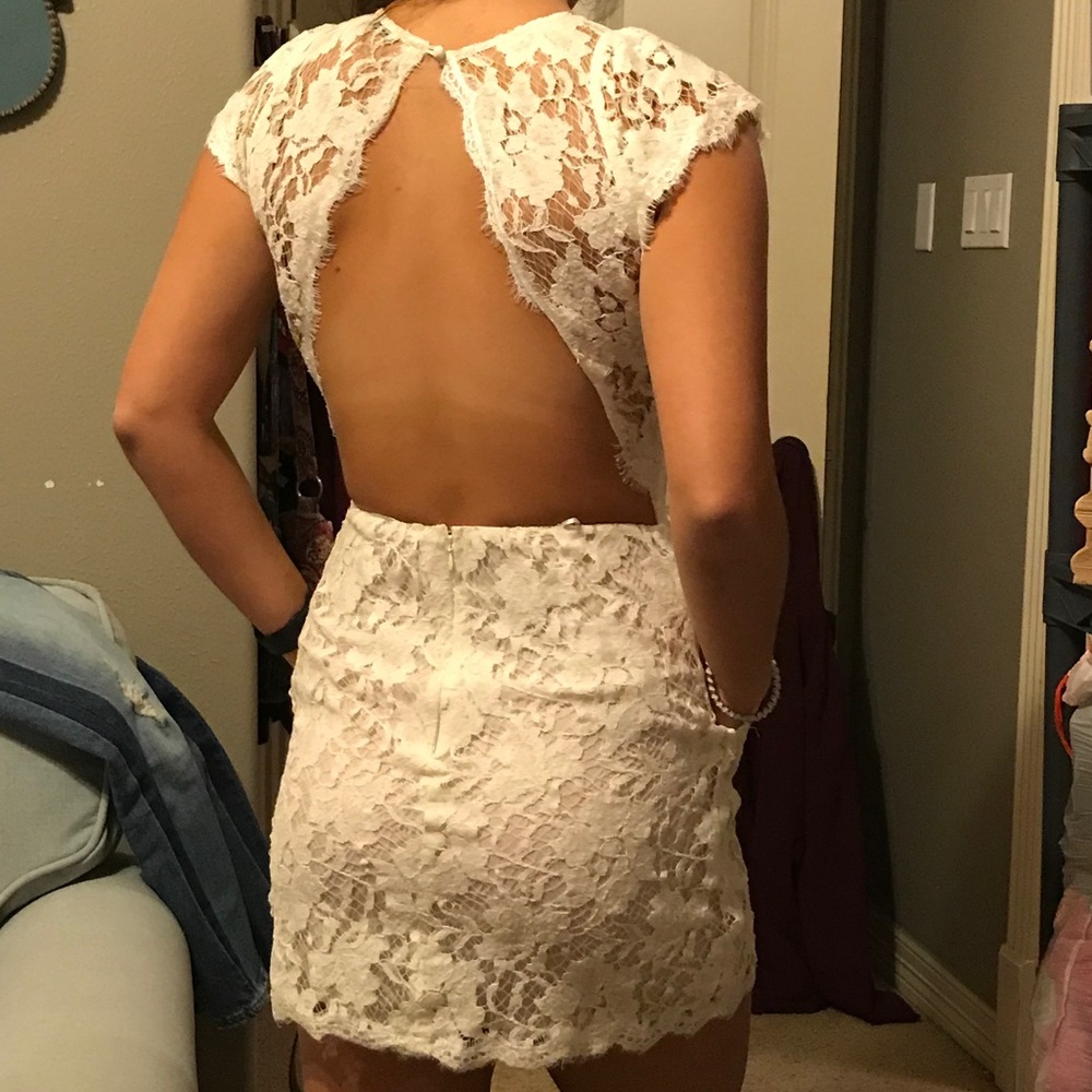 Backless white lace short dress with pockets